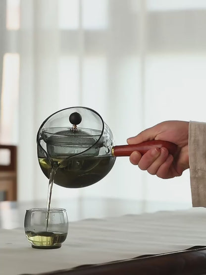 Théière rotative en verre résistante à la chaleur